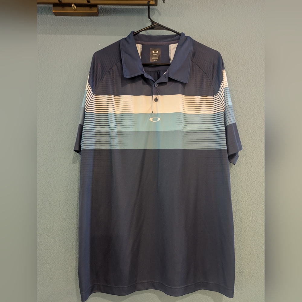 Oakley Men's Polo Shirt in Navy and Light Blue Stripes